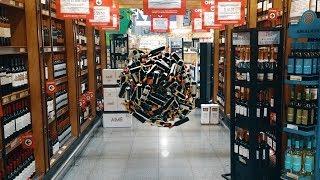 Wine Bottles acting weird in a supermarket.